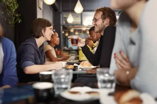 Date at a Busy Coffee Shop