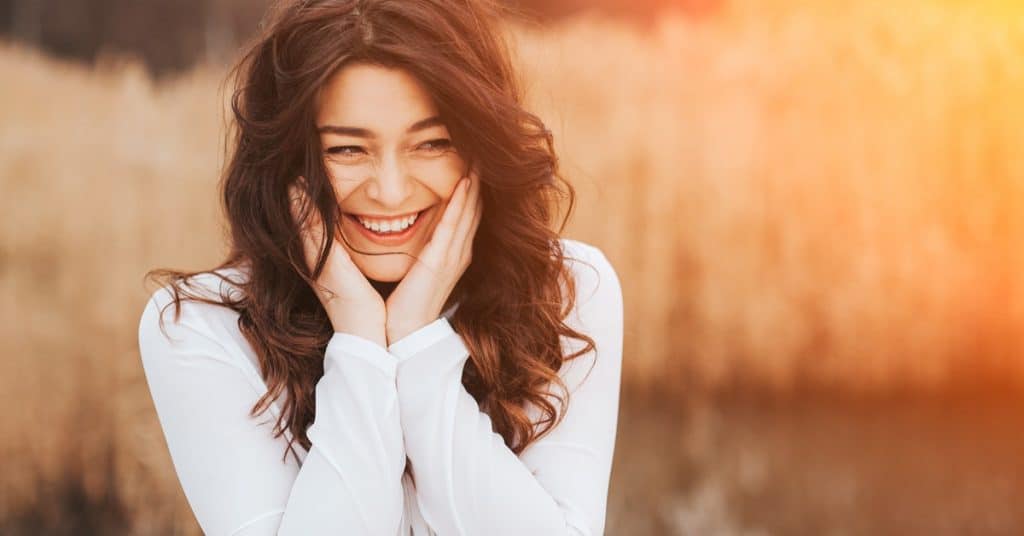Shy Woman at Sunset