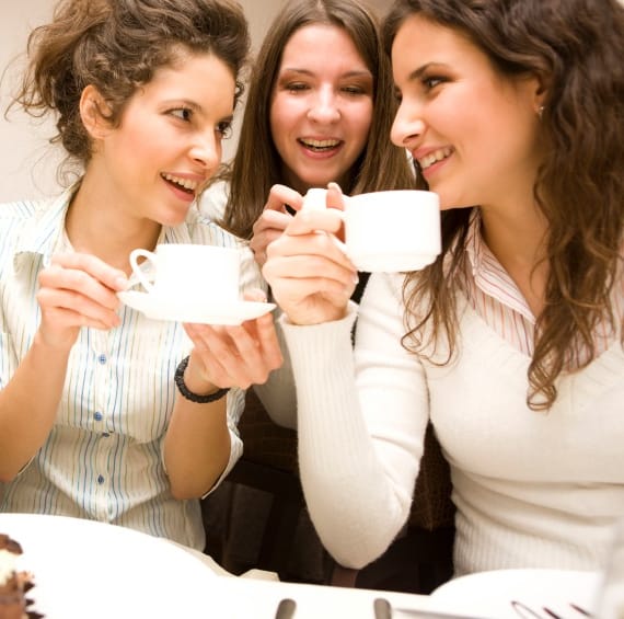 Women Talking Over Coffee