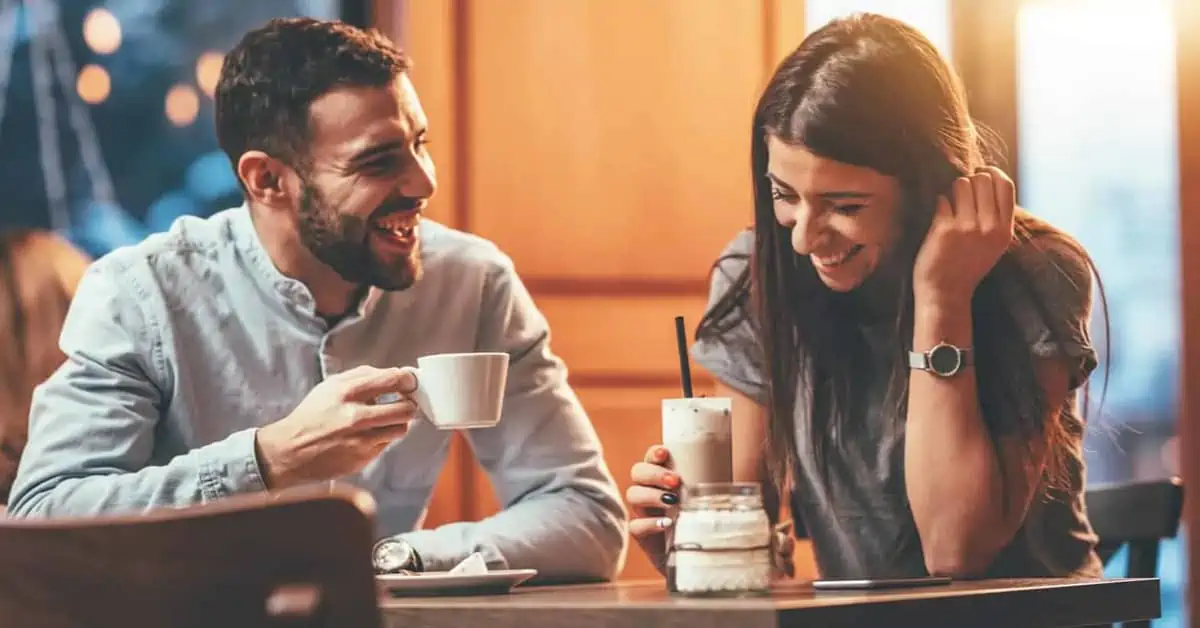 Man and Woman Having Fun on a Coffee Date