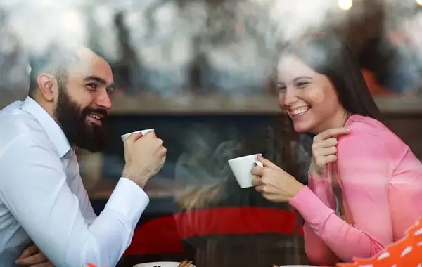 Man and Woman Having a Nice Time in a Coffee Date