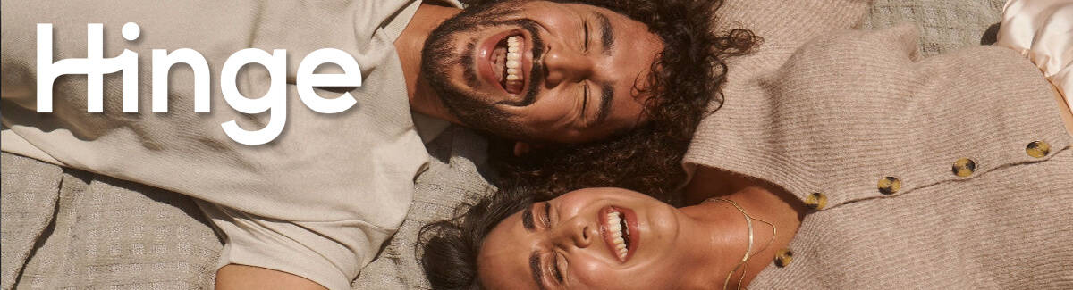 Hinge Dating App Banner - Couple Lying Down Laughing