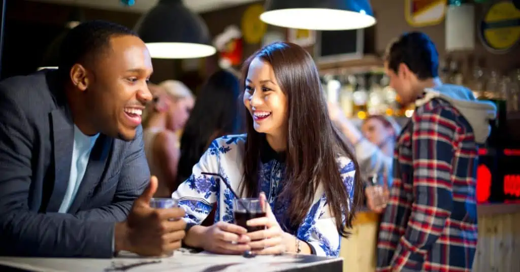 Man and Woman Having a Drink on a Date