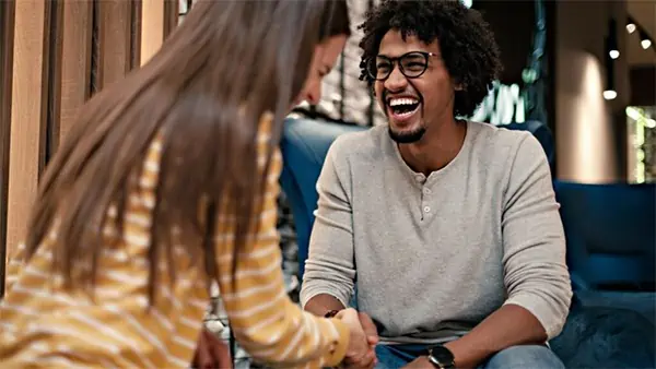 Man and Woman Laughing and Enjoying Time Together