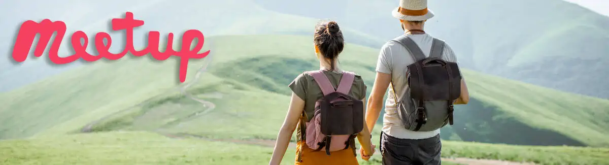 Meetup.com Banner - Couple Hiking Looking at the Mountains