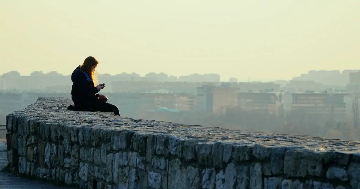 Girl Sitting Alone