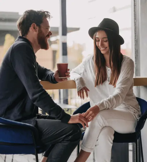 Man and woman on date, with the woman looking away from the man