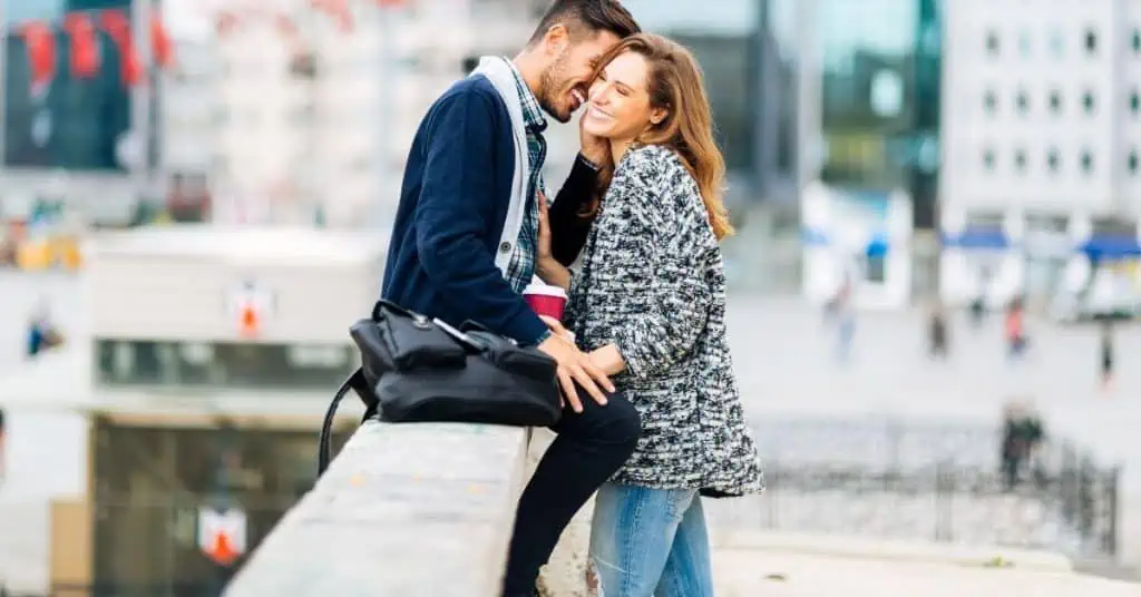 Couple Close Together Laughing and Smiling