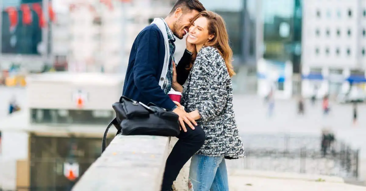 Couple Close Together Laughing and Smiling