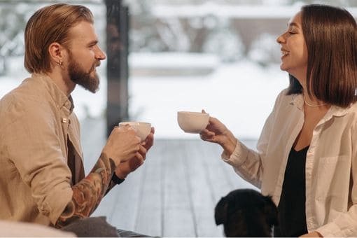 Man and woman getting coffee during dawn date
