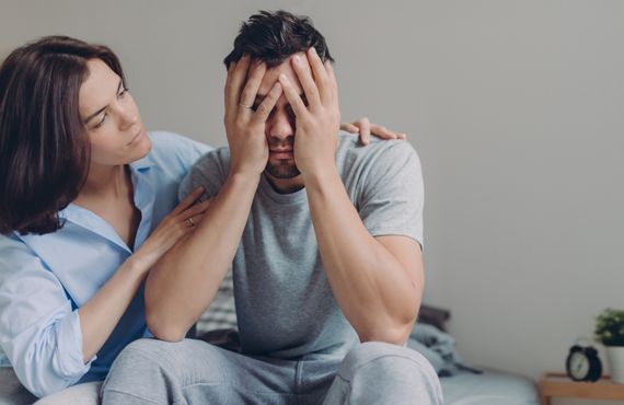 Woman comforting her boyfriend