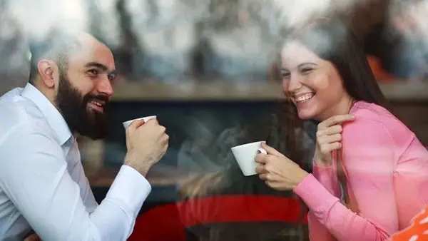 Man and Woman Having a Nice Time in a Coffee Date