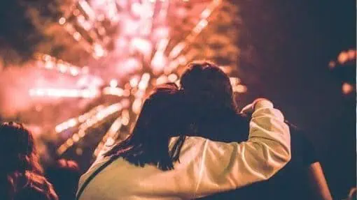 Couple watching fireworks together on New Years