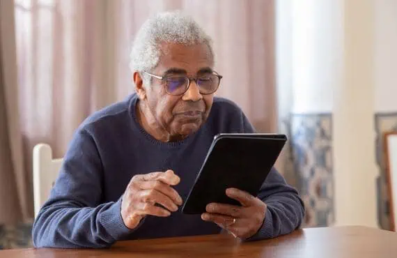 senior adding pictures to their dating profile