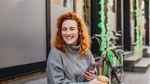 Woman Listening to Podcast