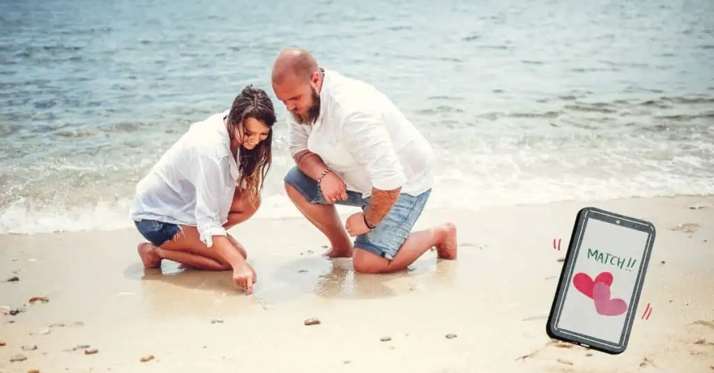 couple kneeling on the beach