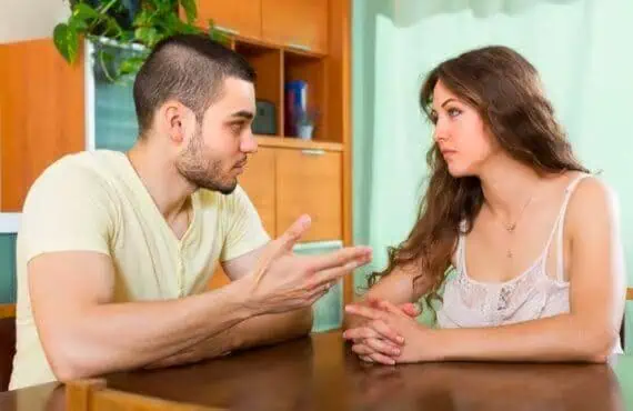 man and woman talking about jealousy
