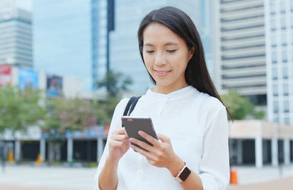 woman checking phone