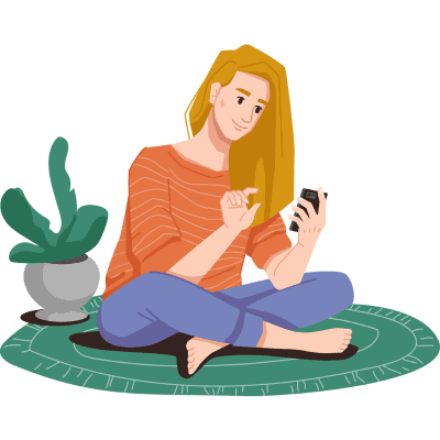 Woman sitting on the ground on phone