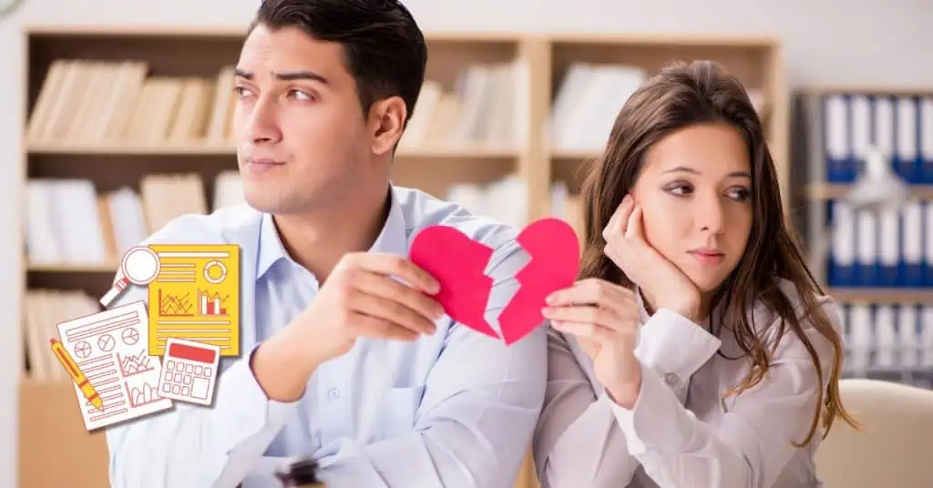 couple sitting next to each other looking away holding parts of a broken heart