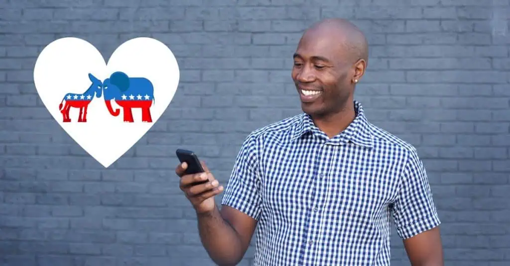 man looking at phone with heart graphic and repbulican vs democrat icon