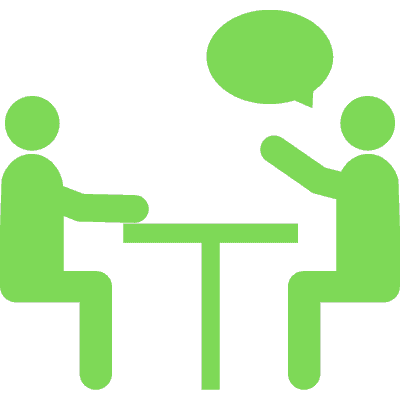 person sitting talking to someone else